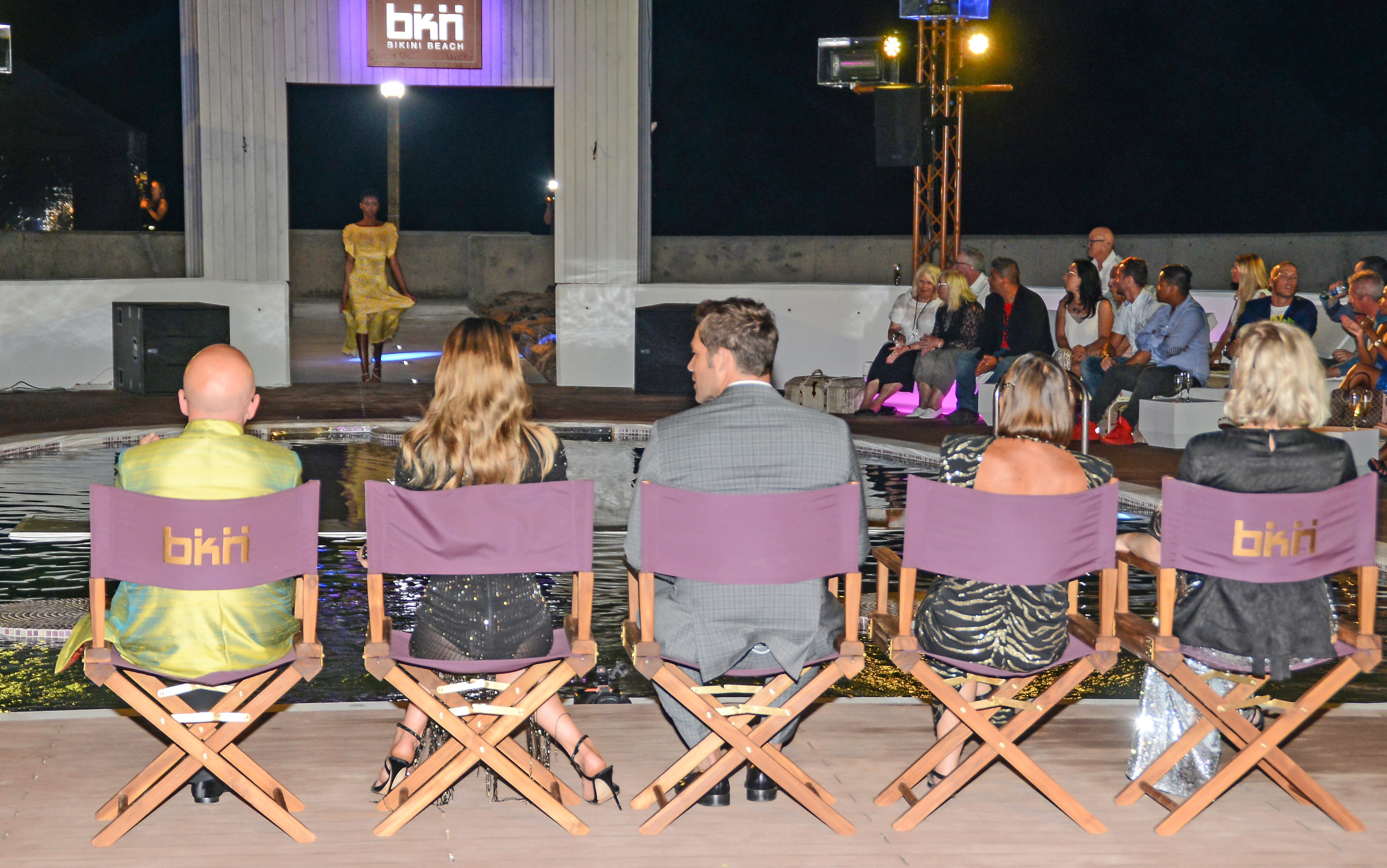 Judges sat watching fashion show