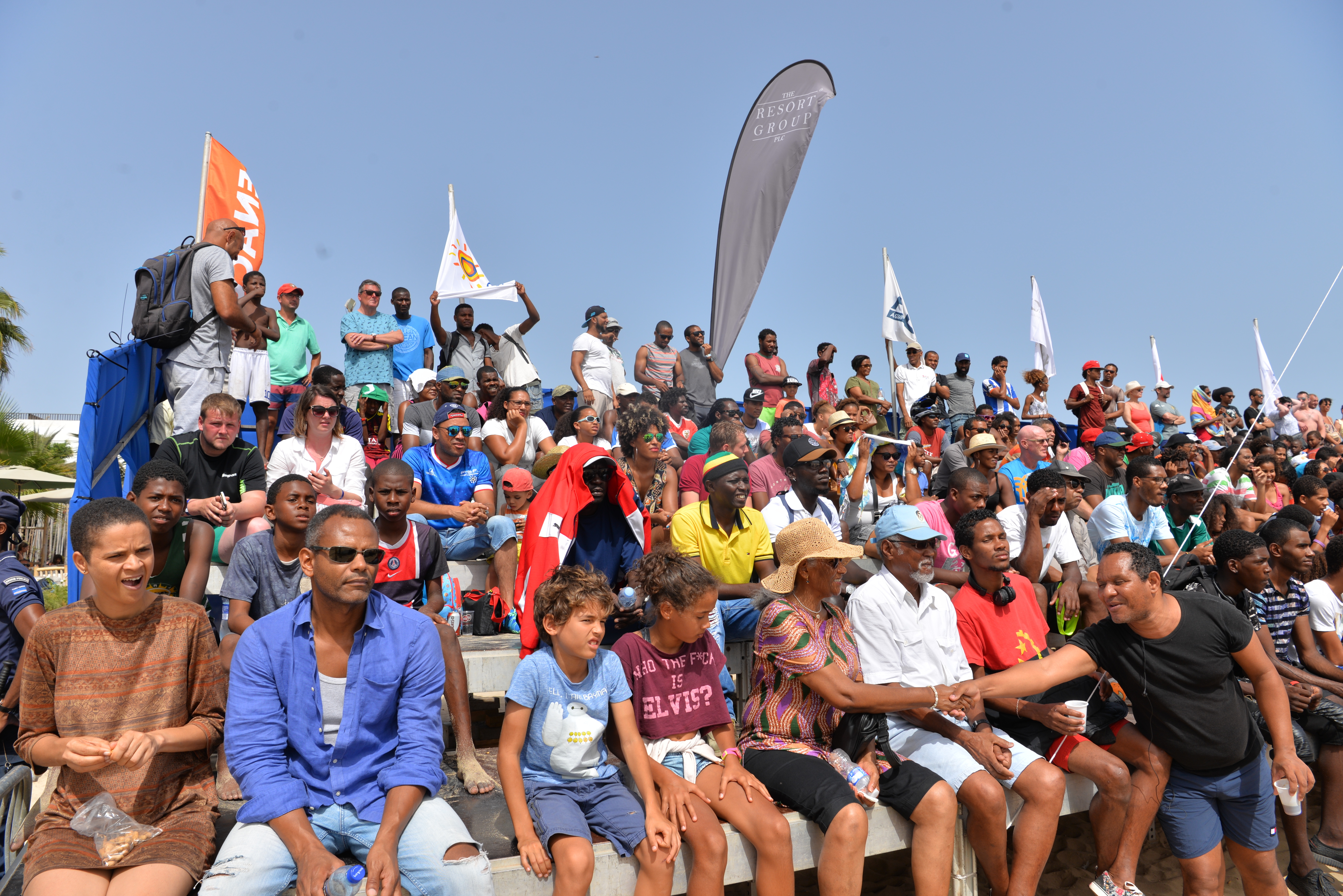 A Large Crowed of people sat watching a show