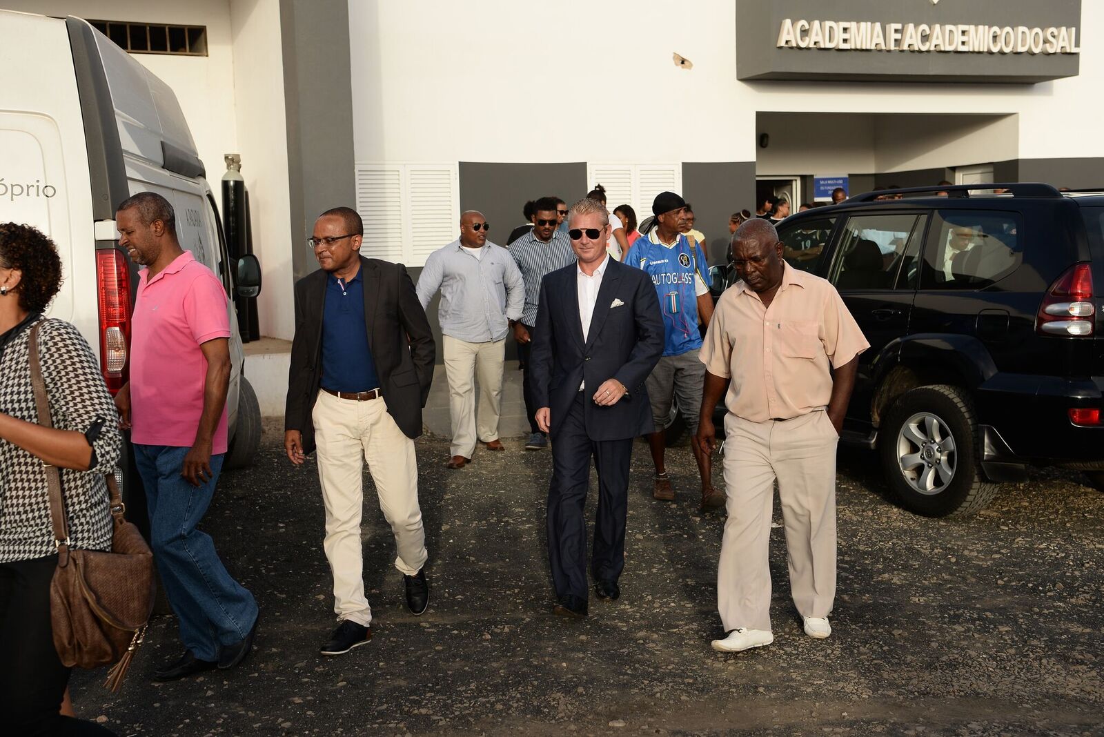 A group of people exiting a building