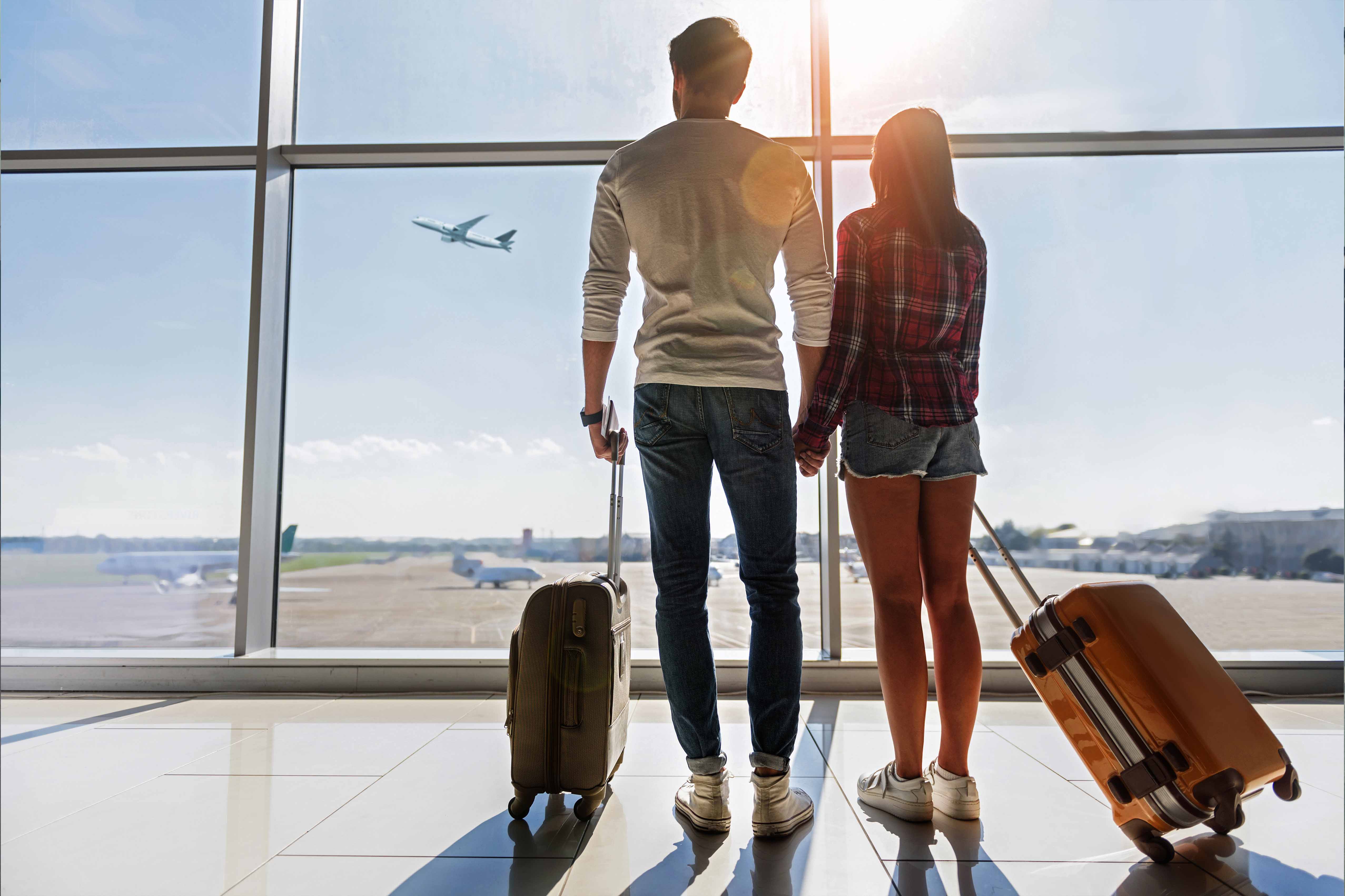 A Couple Looking on to a runway